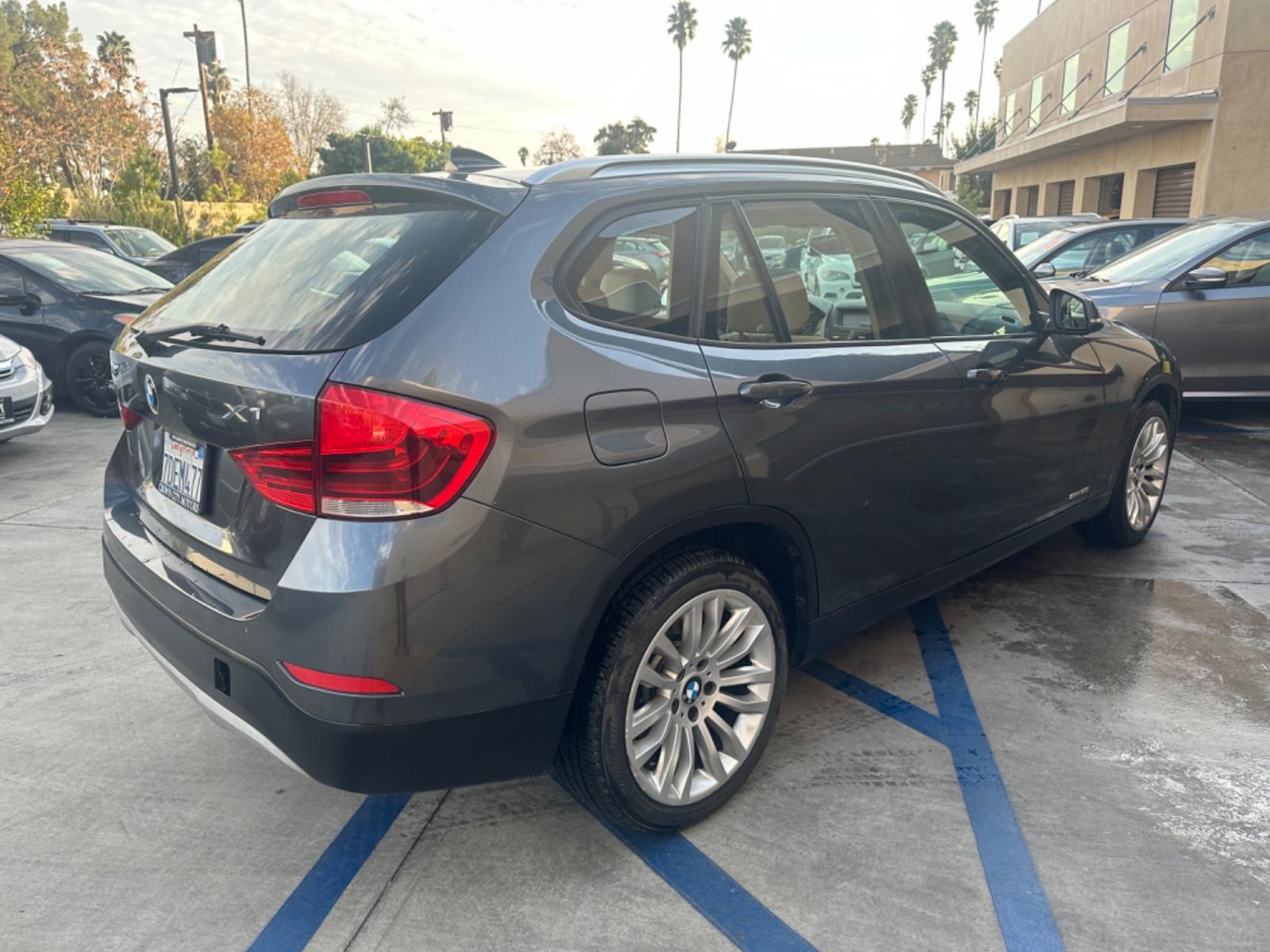 2014 Gray /black BMW X1 leather (WBAVM1C58EV) with an 4 CYLINDER engine, Automatic transmission, located at 30 S. Berkeley Avenue, Pasadena, CA, 91107, (626) 248-7567, 34.145447, -118.109398 - Photo #5